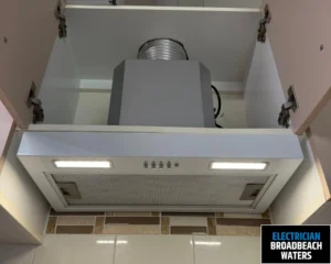 Close-up of a ceiling vent with air conditioning and lighting system.